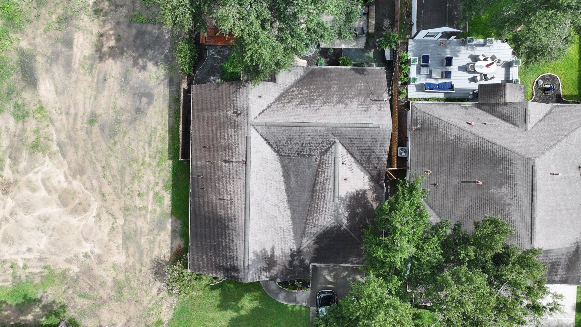 a roof showing damage and all around wear as a roof replacement sign